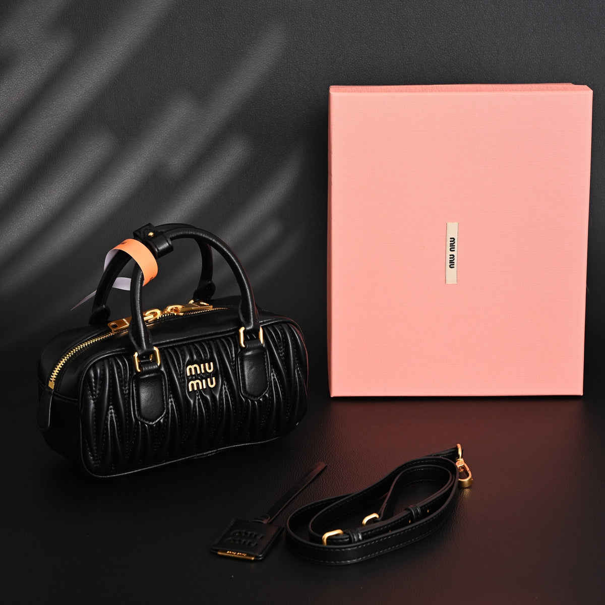 Miu Miu Black Matelassé Leather Top Handle Bag