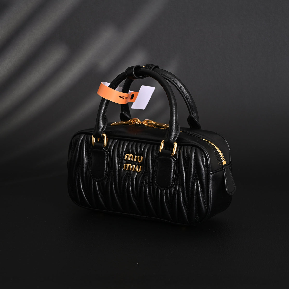 Miu Miu Black Matelassé Leather Top Handle Bag