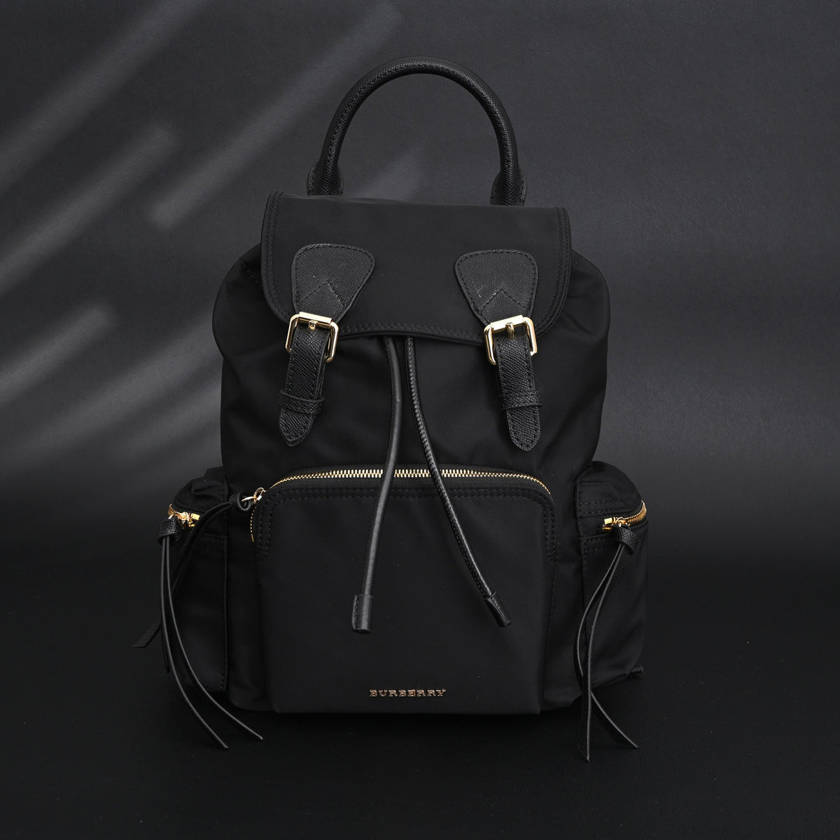 Burberry The Rucksack – Black Nylon & Leather Backpack with Gold-Tone Hardware